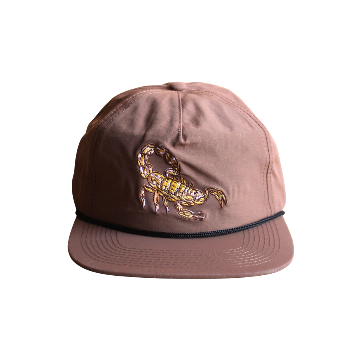 Close up of brown Scorpion Hat with gold embroidered scorpion on the front panel and curved brim.
