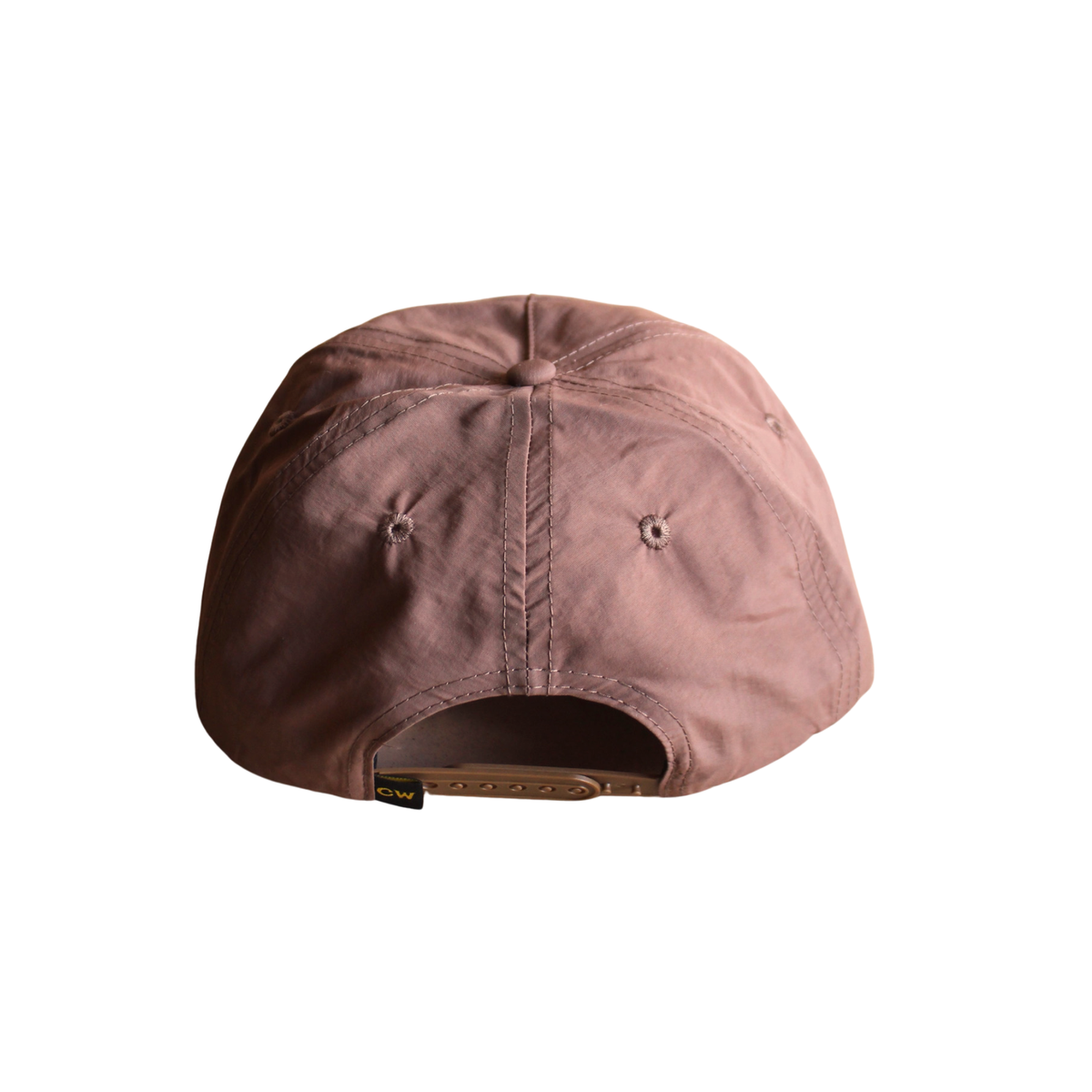 Back view of dusty pink Scorpion Hat showing stitched panels and adjustable strap