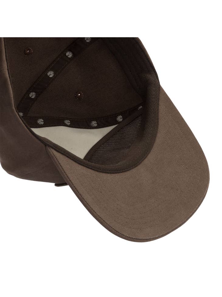 Brown Velociwrangler flat brim hat viewed from inside with inner lining and stitching.