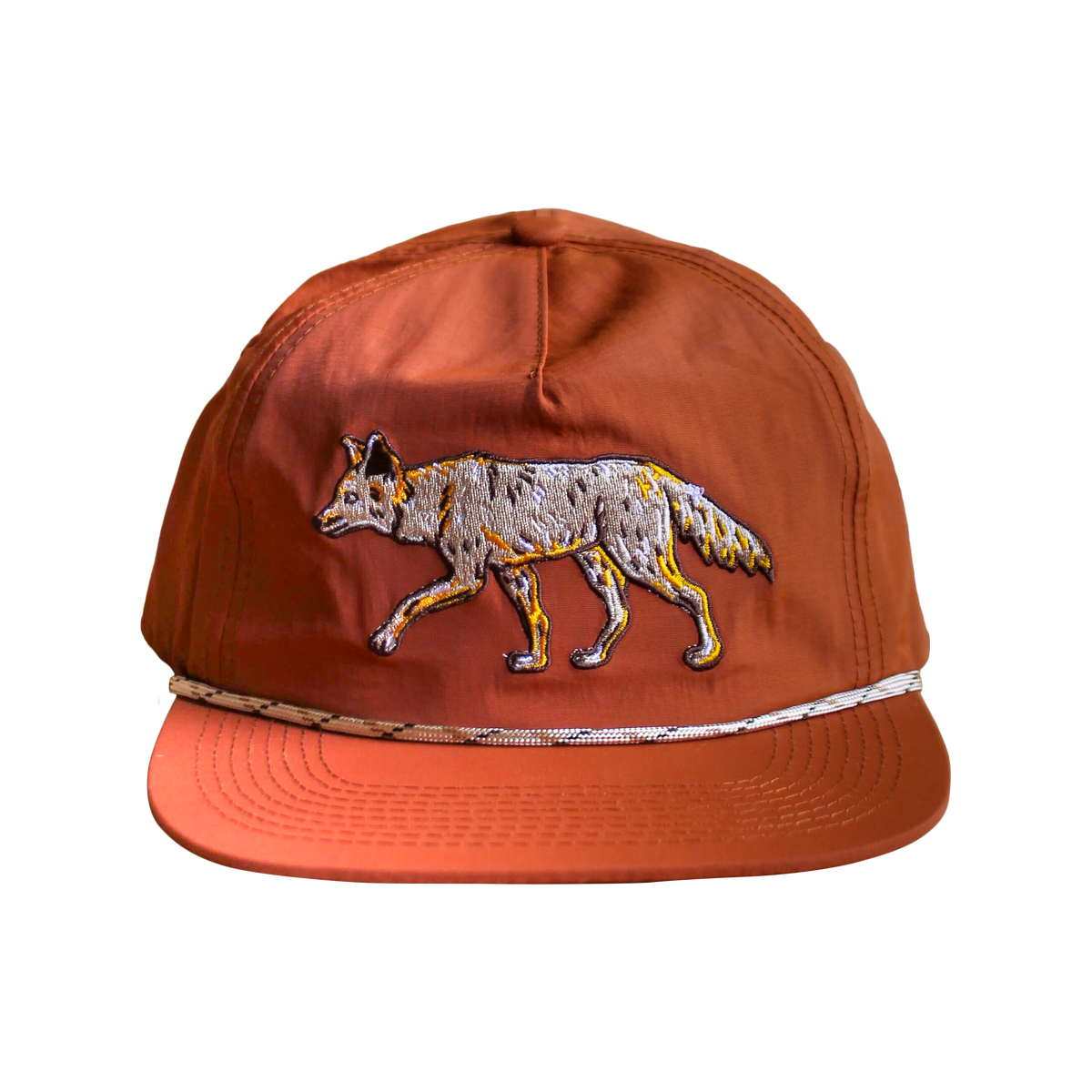 Orange hat features a large embroidered running coyote across the front panel