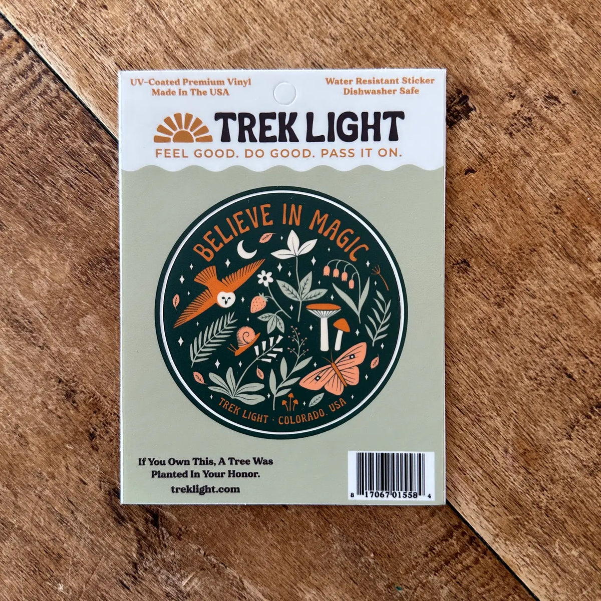 Believe in Magic sticker sheet with a circular nature scene on Trek Light packaging