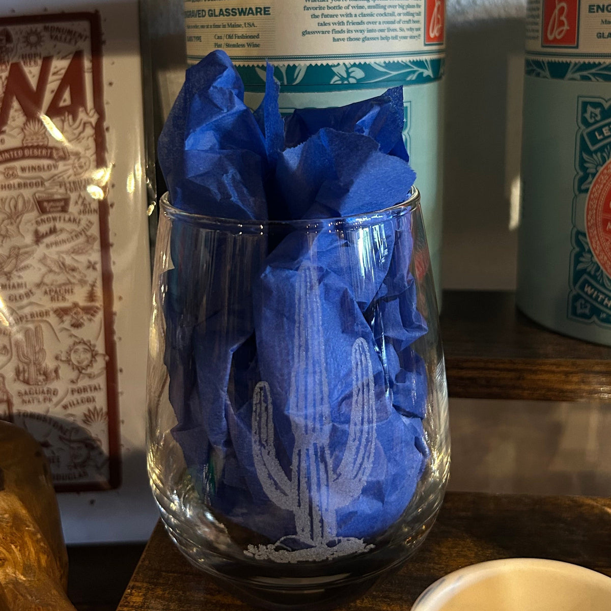 Stemless wine glass etched with a desert scene featuring cacti and rope motifs