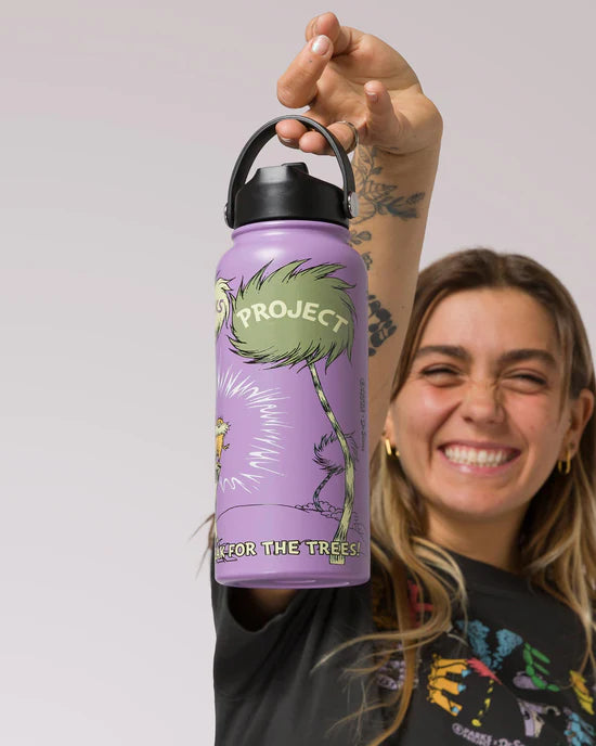 Purple 32oz insulated water bottle with Lorax artwork from Parks Project held up