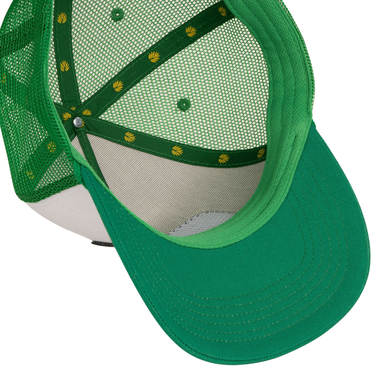 Interior view of a green mesh hat with yellow leaf logo accents along the band.