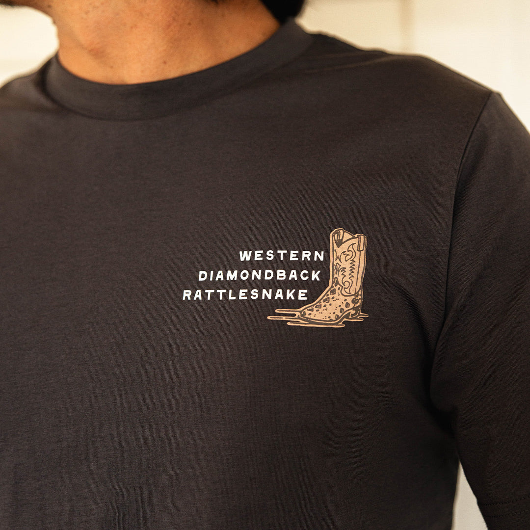 Dark brown Rattlesnake T shirt featuring a tan boot and coiled rattlesnake graphic with Western Diamondback Rattlesnake text