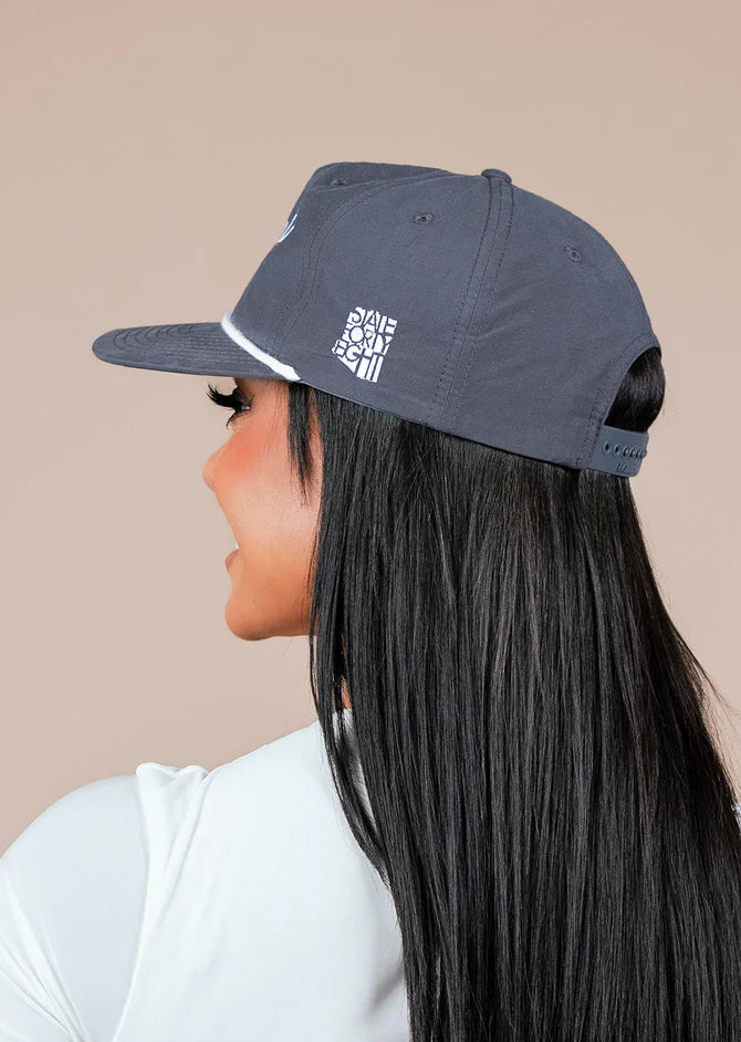 Side profile of a model wearing a dark gray Arizona Script Snapback.
