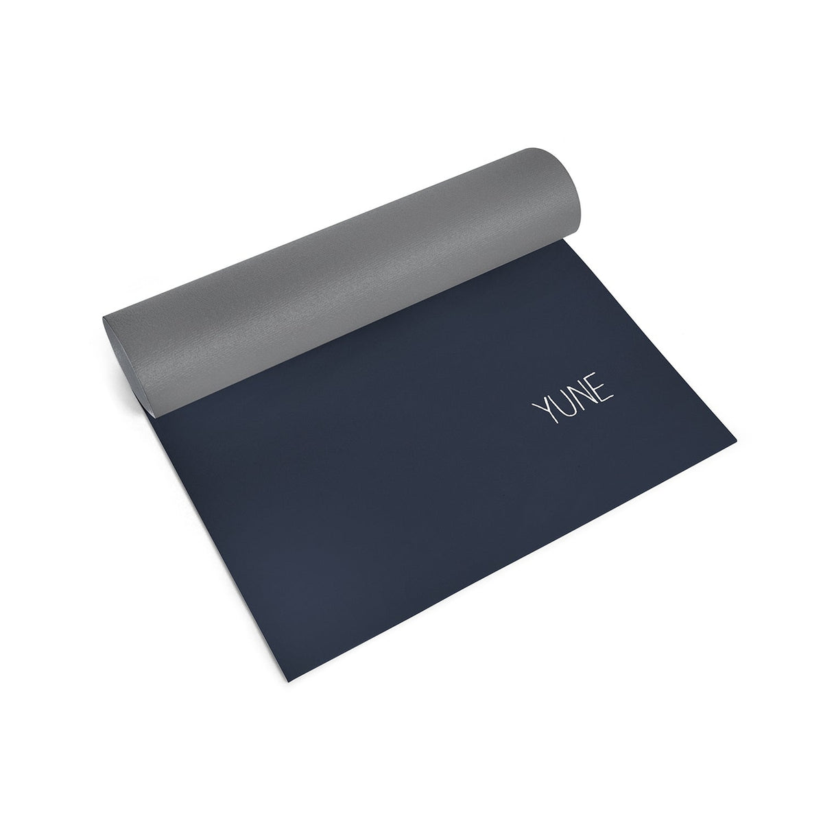 Rolled navy Alpha Centurion Yoga Mat with a gray top and YUNE branding.