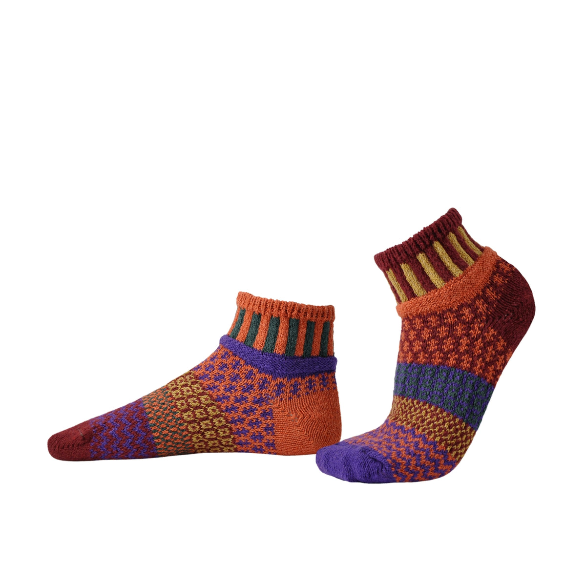 Two multicolor eco friendly quarter socks with bold cuffs and geometric knit patterns.