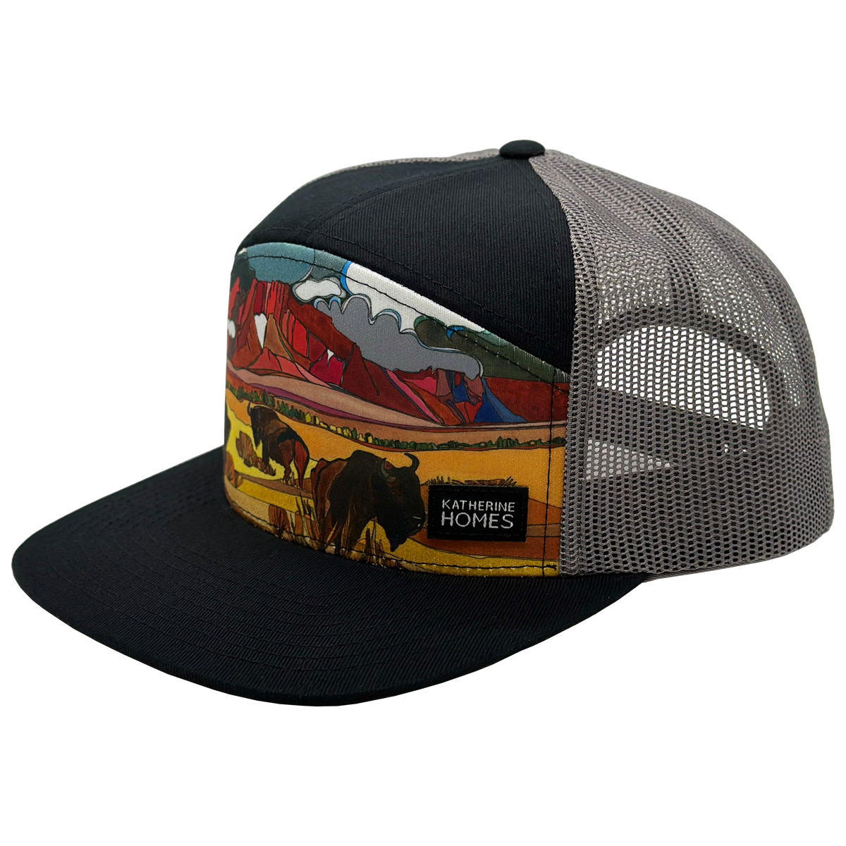 Bison and prairie landscape graphic on a flat brim trucker hat with a black front panel and gray mesh back