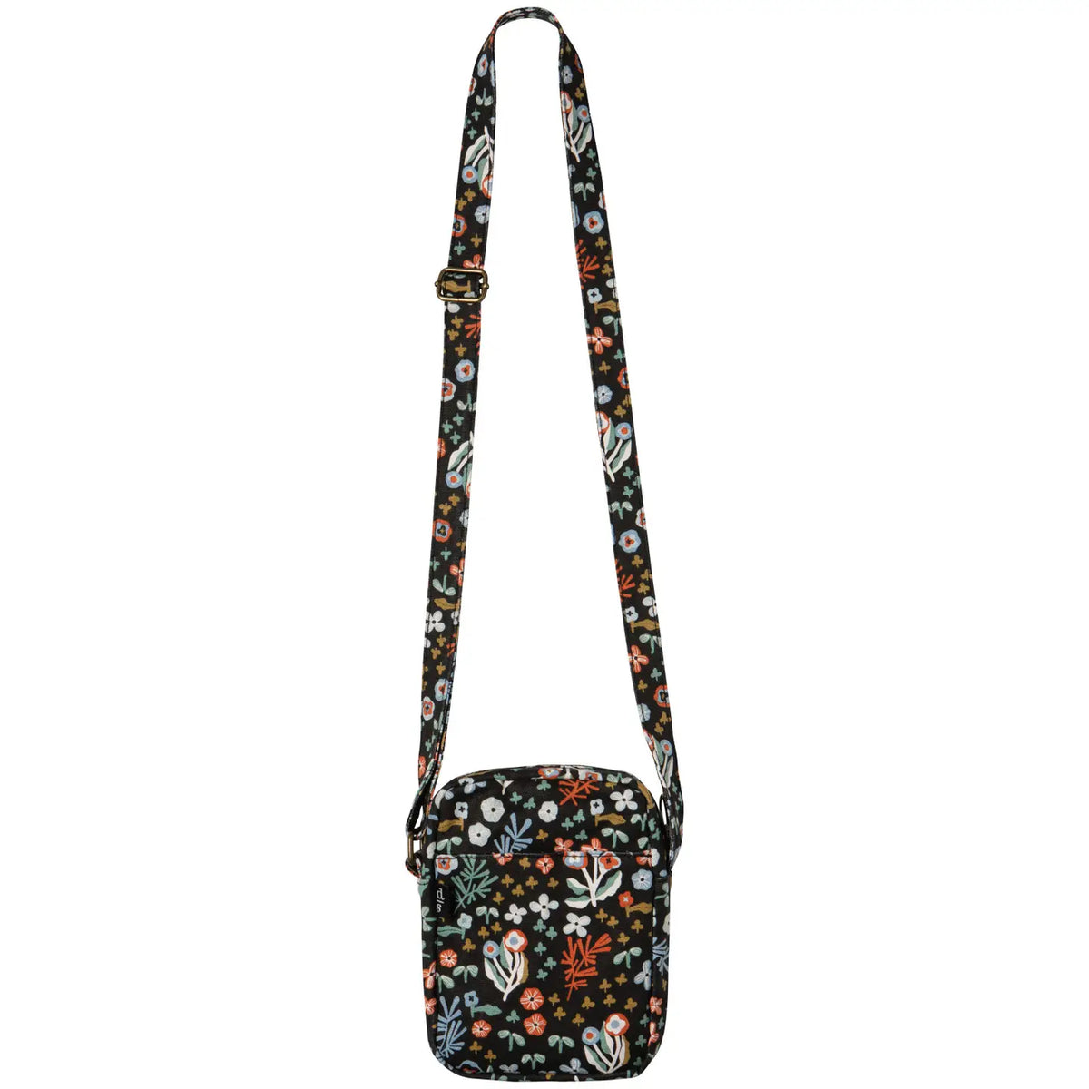 Dogwood crossbody bag featuring a long floral strap and front zip pocket on a black background