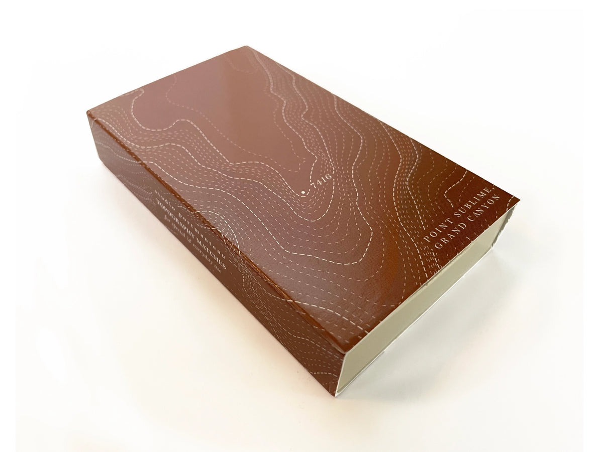 Brown box for Grand Canyon Topography Large Matches with white contour lines across the lid.