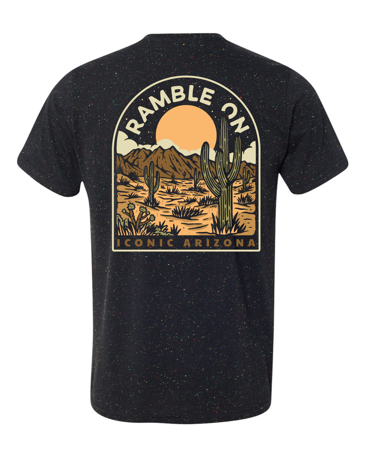 Close up of the back graphic on the dark speckled tee featuring a large orange sun rising behind desert mountains and tall cacti