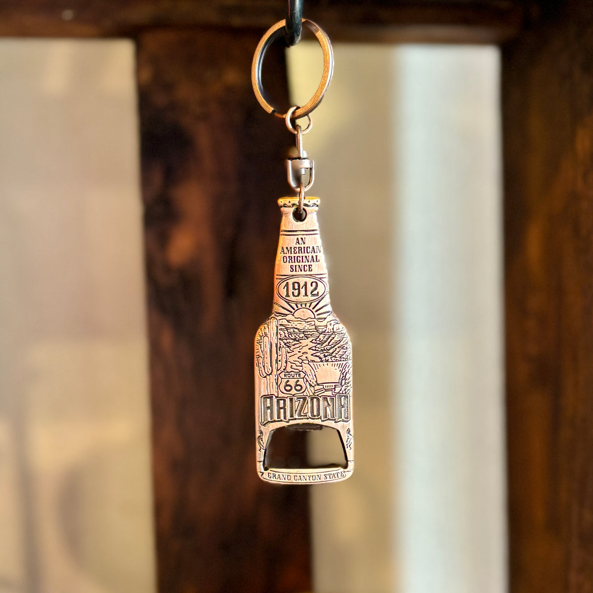 Copper bottle opener keychain with round ring and attached chain