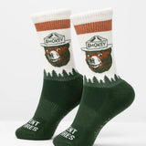 Prevent Wildfires socks featuring Smokey Bear white socks with orange band and green forest pattern