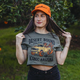 Woman wearing a gray Desert Bound Crop Tee featuring a desert jeep graphic