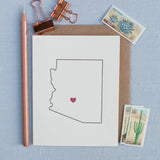 Love Arizona greeting card showing a simple outline of Arizona with a small red heart