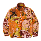 Front view of a vibrant multicolor fleece jacket with a jungle print and a green Parks Project patch on the chest