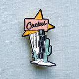 Cactus Motel sticker with a retro desert sign and cacti