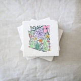 White marble coaster with a colorful desert floral illustration