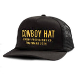 Black trucker hat with yellow embroidered Cowboy Hat Sendero Provisions Co Trademark 2014 on the front panel
