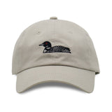 Beige dad hat with an embroidered black loon logo on the front.
