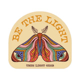 Be The Light sticker with a colorful moth design and Trek Light Gear text.