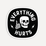 Everything Hurts sticker featuring a skull on a black background.