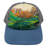 American Basin Foam Trucker hat front view with colorful mountain landscape artwork, gray mesh back, and blue crown button.