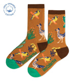 Brown southwestern socks with colorful birds and desert plants, green toes and heels.