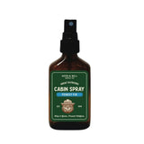 Cabin spray bottle labeled Forest Fir with Smokey Bear graphic and green label.