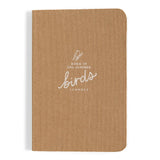 Brown linen journal cover with a white embossed logo reading Book of One Hundred Birds