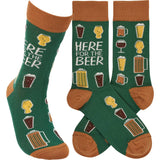 Green Here for the Beer socks with orange toes and cuffs and beer mug patterns