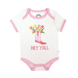 White baby onesie with pink trim featuring a pink boot bouquet and HEY YALL text