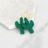 Green glitter cactus acrylic hoop earrings on gold hoops
