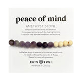 Peace of Mind Amethyst Stone aromatherapy bracelet with purple to natural wood beads on a white display card