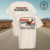 White 70s retro Roadrunner unisex tee with Forever Ramblin graphic and retro stripe motif against a desert road backdrop.