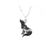 Wolf-shaped pendant with a night mountain landscape on a silver chain