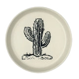 Round white coaster featuring a black saguaro cactus illustration.