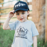 Kids' tee with outdoor camping scene van mountains sun and Happy Camper text