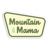 Mountain Mama sticker with cream background and green border, displaying Mountain Mama text and a small pine tree graphic