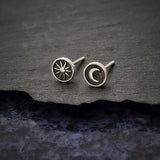Sterling silver Sun and Moon stud earrings with a sunburst design and crescent moon motif
