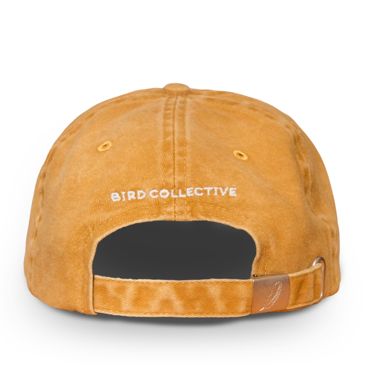 Back view of mustard washed dad hat with white Bird Collective embroidery and leather strap