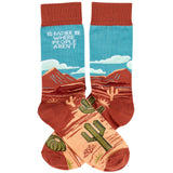 Unisex desert themed sock with teal leg and red canyon landscape and cactus accents