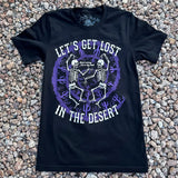 Let's Get Lost In The Desert tee with skeletons dancing inside a purple circle and bold white text on black fabric