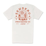 Flat lay of white De Sonora tee showing a large red desert scene graphic on the back