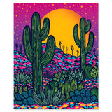 Midnight desert art print with tall cacti beneath a purple sky and a bright orange sun setting behind the hills.