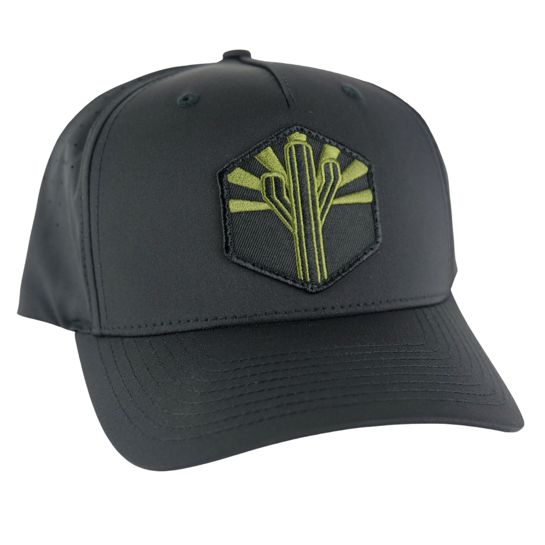Dark military style trucker hat featuring olive green cactus emblem on a hex patch with sun rays