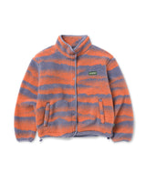 Front view of the orange and lavender striped high pile fleece jacket with a full zipper and Park Projects patch on the chest