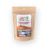 Front view of Prickly Pear Flavor Gourmet Coffee bag with Cactus Candy label and desert illustration
