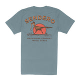 Back view of blue Desert Runner T Shirt featuring a large vintage roadrunner and sunset graphic
